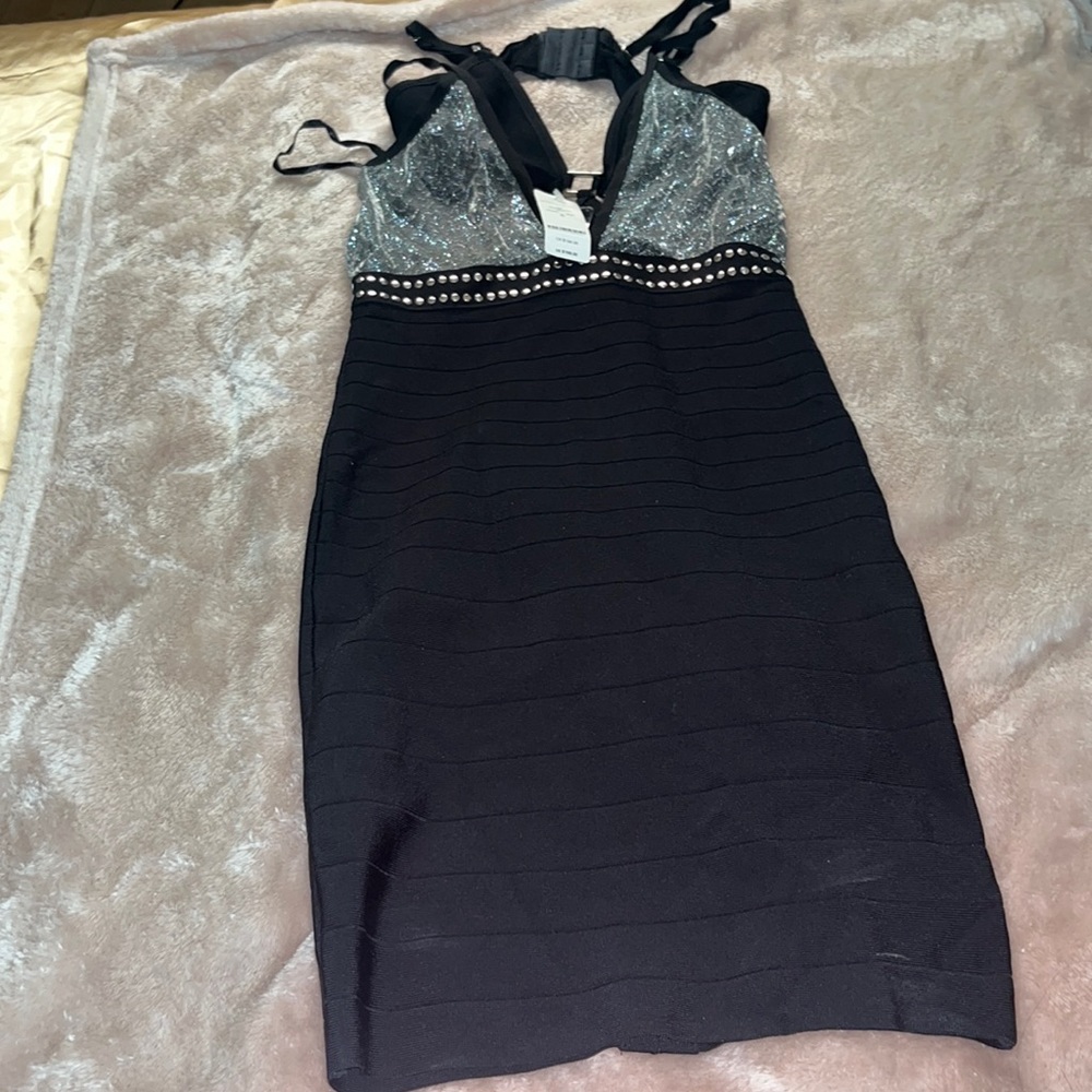 Tight small BEBE black and silver mesh top dress super cute.